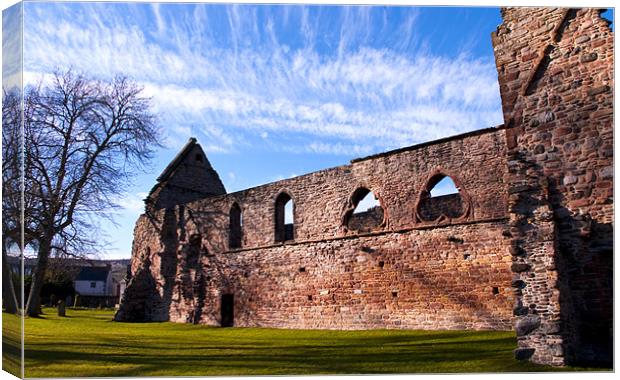 Clouds Behind Beauly Priory Canvas Print by Jacqi Elmslie