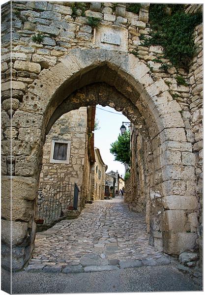 The Guard Gate, Lacoste, France Canvas Print by Jacqi Elmslie