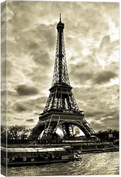 Eiffel Tower By The Seine Canvas Print by Jim kernan