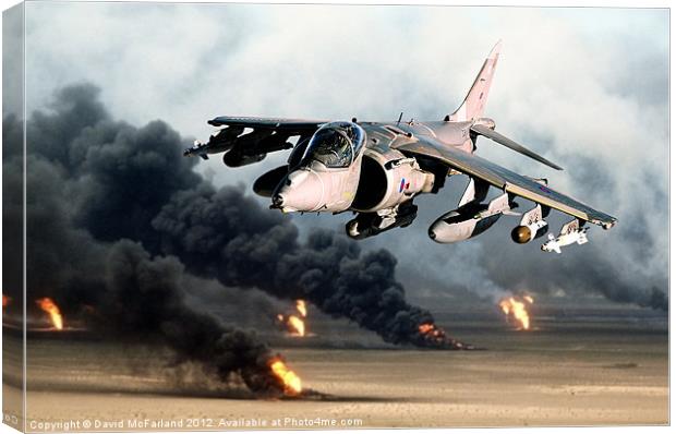 Low-level Harrier over burning oil wells Canvas Print by David McFarland