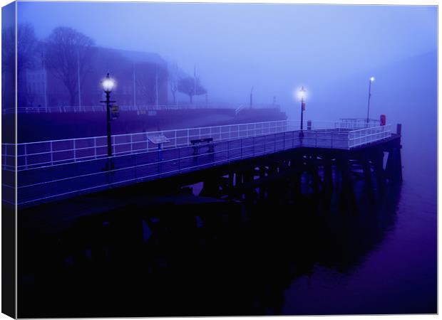 Pier through the mist Canvas Print by Martin Parkinson