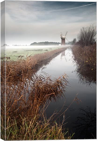 Mist lifting over Horsey MIll Canvas Print by Stephen Mole