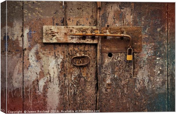 Old Bolt and Padlock Canvas Print by James Rowland