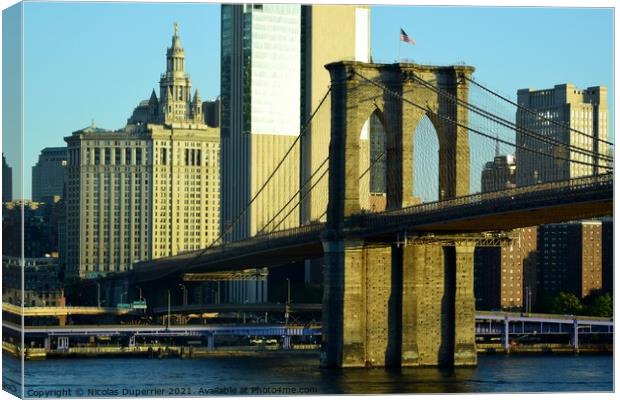 Brooklyn bridge at sunrise, New York City Canvas Print by Nicolas Duperrier