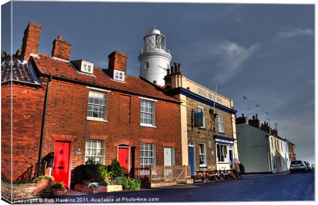 The Pub & the Lighthouse Canvas Print by Rob Hawkins