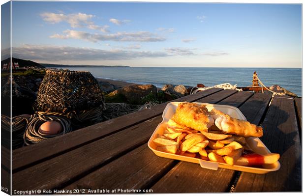 Fish n chips on the beach Canvas Print by Rob Hawkins