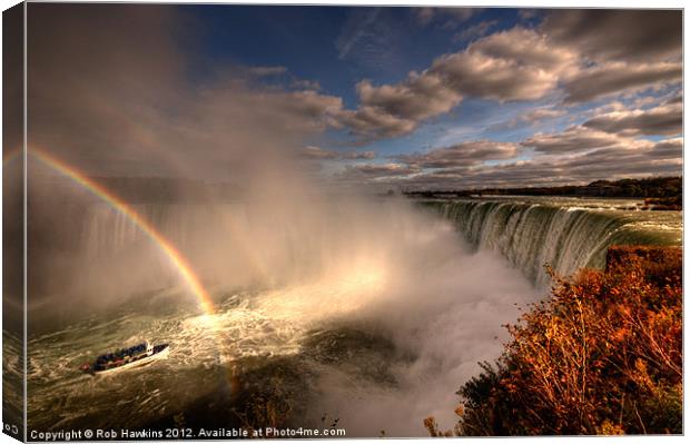 Rainbows over Niagara Falls Canvas Print by Rob Hawkins