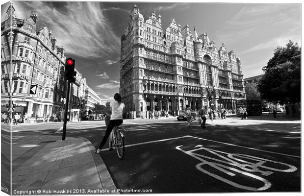 Cycling in the city Canvas Print by Rob Hawkins