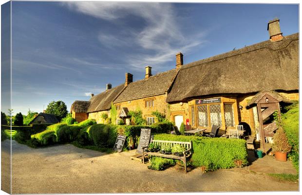 Thatched Cottages at Great Tew Canvas Print by Rob Hawkins