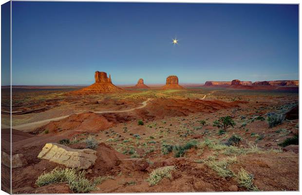 Moonlight over Monument valley Canvas Print by Rob Hawkins