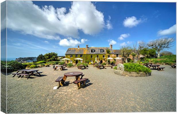 Old Portelet Inn Canvas Print by Rob Hawkins