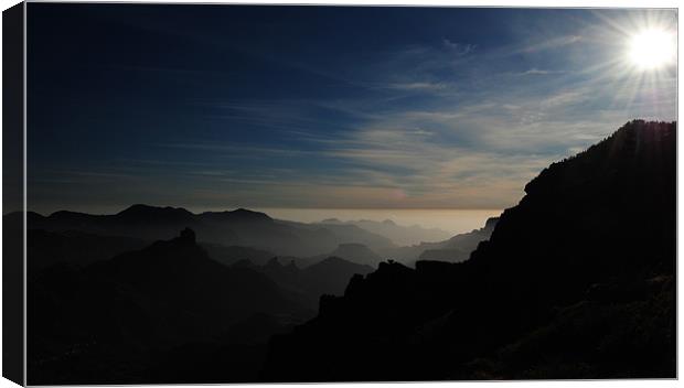 Mountain silhouettes Canvas Print by Rob Hawkins