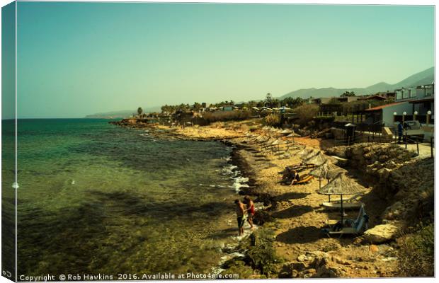 Malia beach Canvas Print by Rob Hawkins