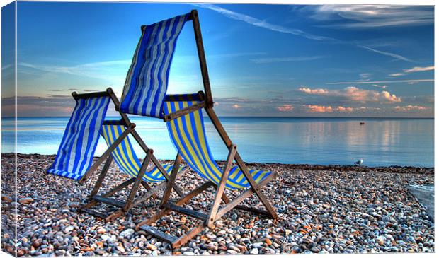 Deckchairs at Beer Canvas Print by Rob Hawkins