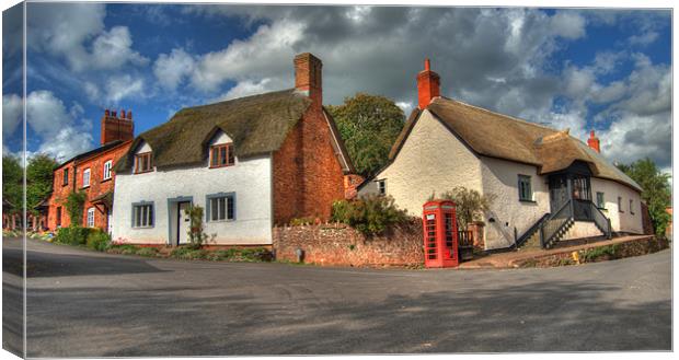Thatched cottages of Halse Canvas Print by Rob Hawkins