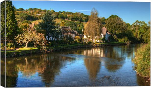 Devon Thatch on the Exe Canvas Print by Rob Hawkins