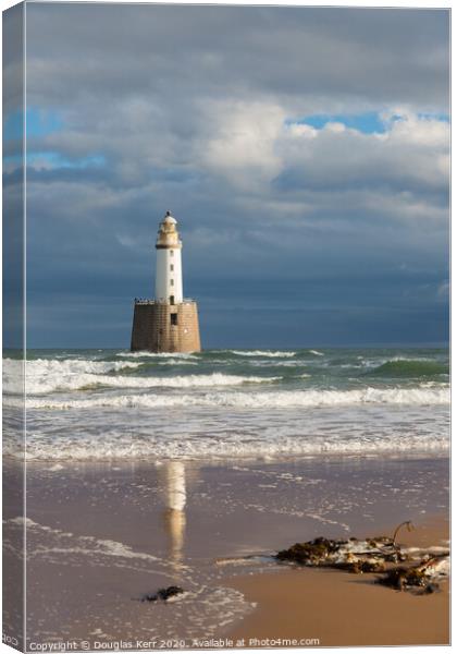 Rattray Head Lighthouse, reflection and seaweed in Canvas Print by Douglas Kerr