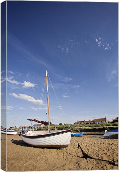 Stranded on sands of Burnham Overy Staithe Canvas Print by Paul Macro