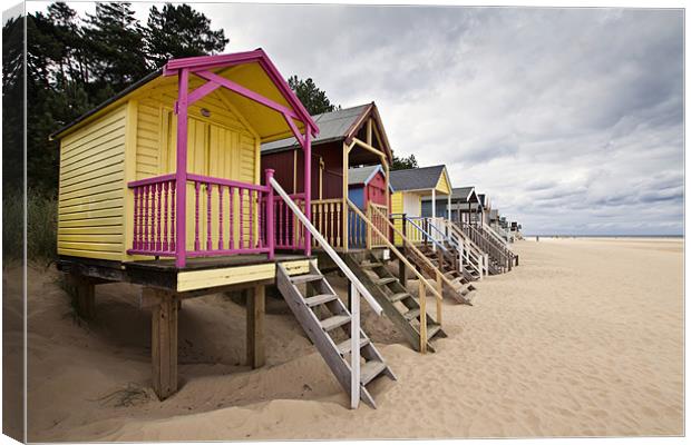 Colourful Beach Huts in Wells Canvas Print by Paul Macro