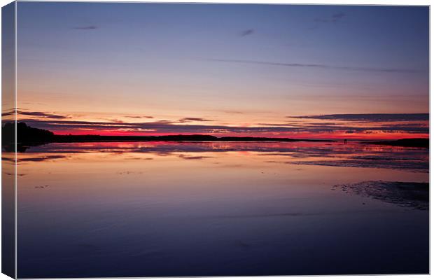 Fire in the Sky on Holkham Beach Canvas Print by Paul Macro