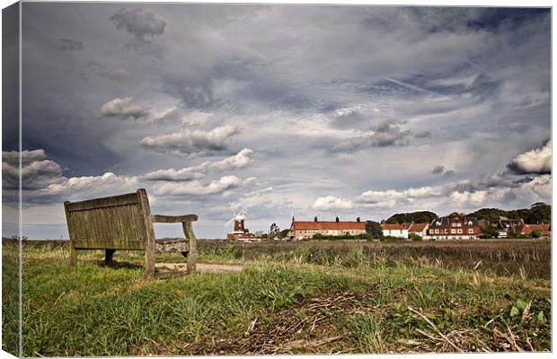 Seat with a View of Cley Canvas Print by Paul Macro