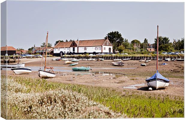Burnham Boathouse from the Marshes Canvas Print by Paul Macro