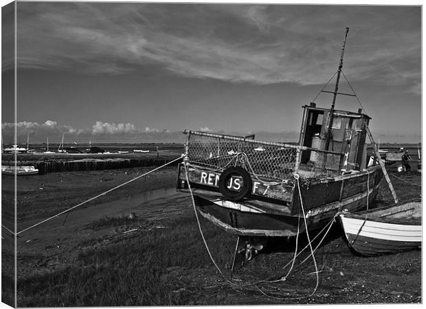 Stranded in Brancaster Staithe Creek Canvas Print by Paul Macro