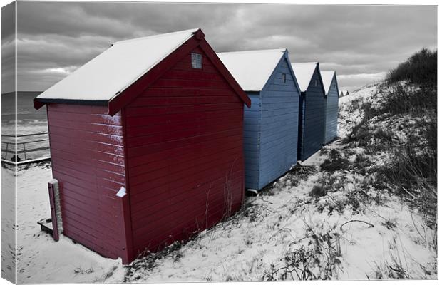 Winter Beach Huts with Selective colour Canvas Print by Paul Macro