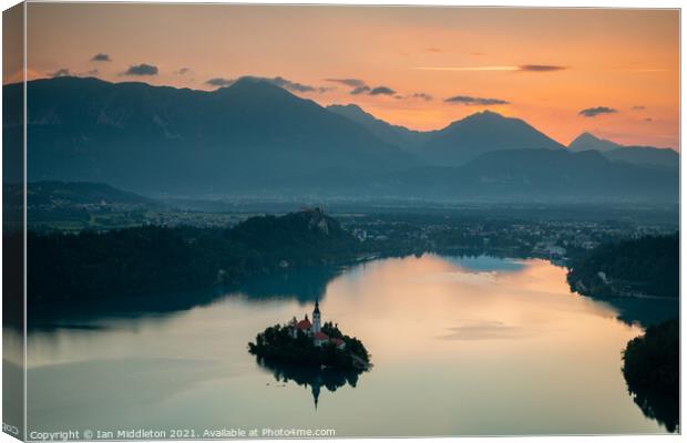 Sunrise over Lake Bled from Mala Osojnica Canvas Print by Ian Middleton