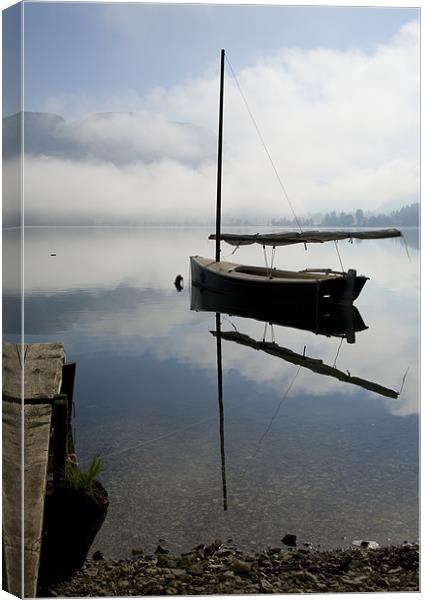 Misty morning on Lake Bohinj Canvas Print by Ian Middleton