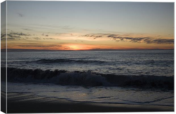 Levanto Beach sunset Canvas Print by Ian Middleton