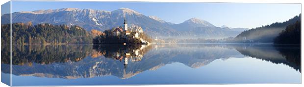 Reflections on Lake Bled Canvas Print by Ian Middleton