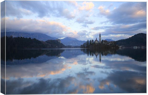Dusk over Lake Bled Canvas Print by Ian Middleton