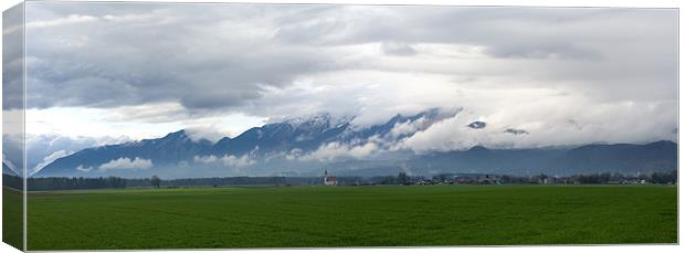 Kamnik Alps panoramic Canvas Print by Ian Middleton