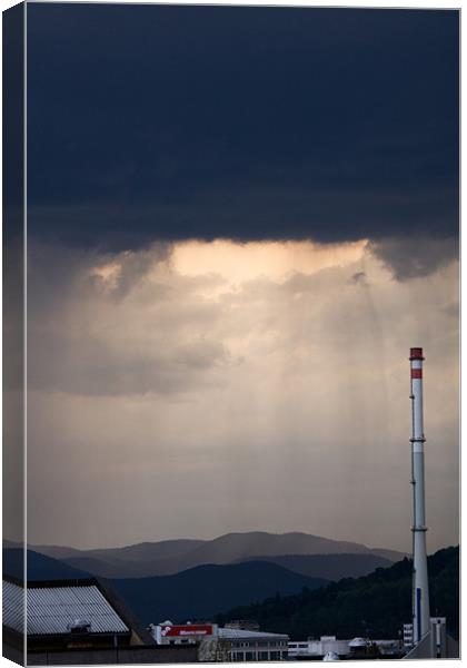 Storm and rain over residential area of Ljubljana. Canvas Print by Ian Middleton