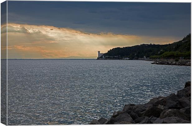 Evening light over Miramare castle Canvas Print by Ian Middleton