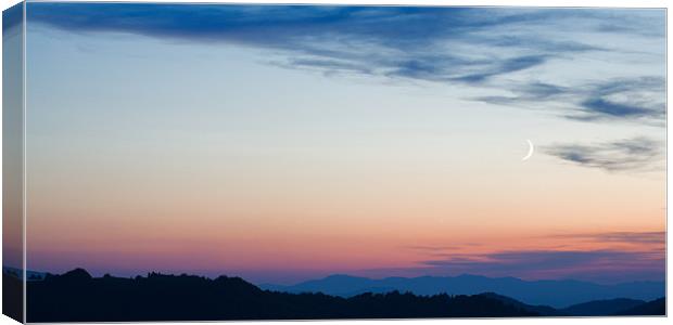 Crescent moon twilight Canvas Print by Ian Middleton