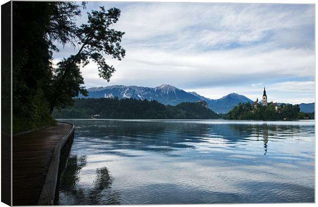 After storm light over Lake Bled Canvas Print by Ian Middleton