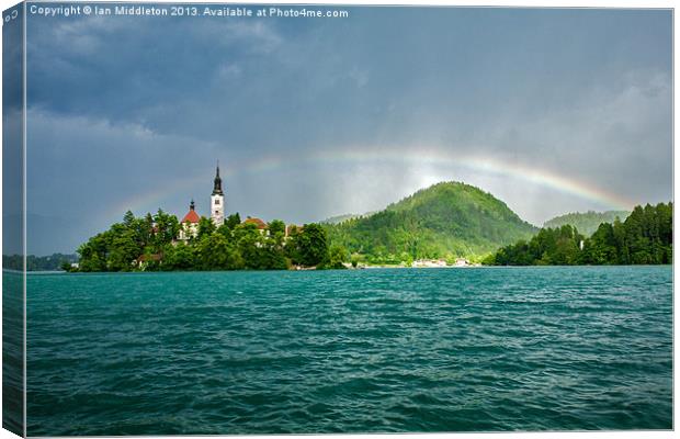 Rainbow over Lake Bled Canvas Print by Ian Middleton