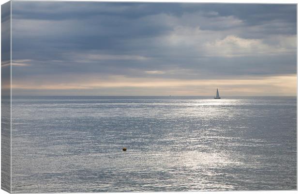 Sailing the silver sea. Canvas Print by Ian Middleton