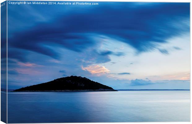 Storm moving in over Veli Osir Island at sunrise Canvas Print by Ian Middleton