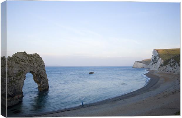 Durdle Door near Lulworth cove in the morning. Canvas Print by Ian Middleton