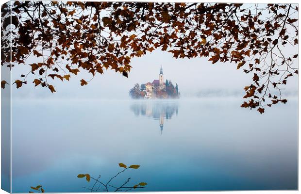 Autumn Mist over Lake Bled Canvas Print by Ian Middleton