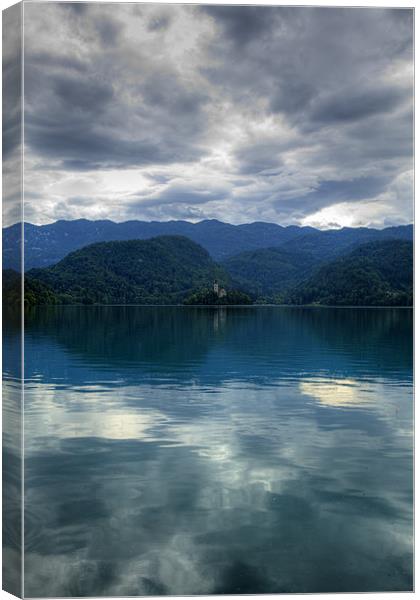 Cloud reflections Canvas Print by Ian Middleton