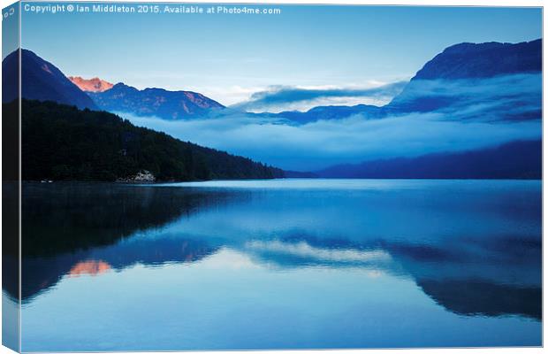 Morning at Lake Bohinj in Slovenia Canvas Print by Ian Middleton