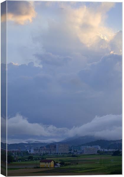 Storm clouds gather over Ljubljana, Slovenia Canvas Print by Ian Middleton