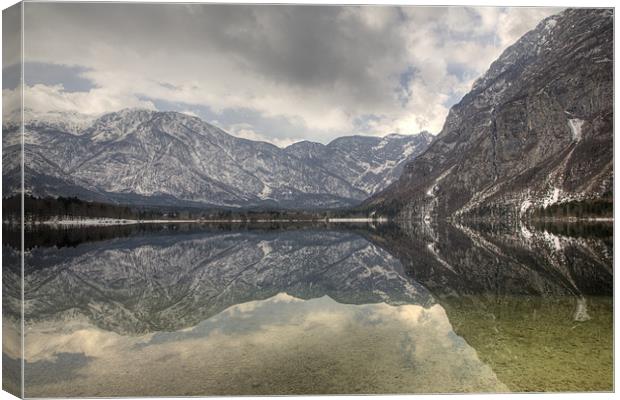 Reflections of the Julian Alps Canvas Print by Ian Middleton