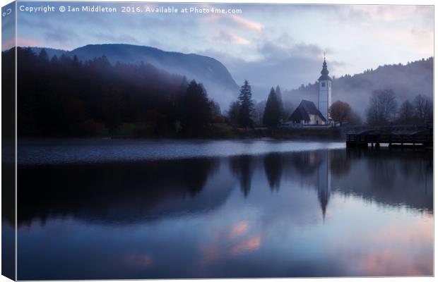 Morning at Lake Bohinj in Slovenia Canvas Print by Ian Middleton