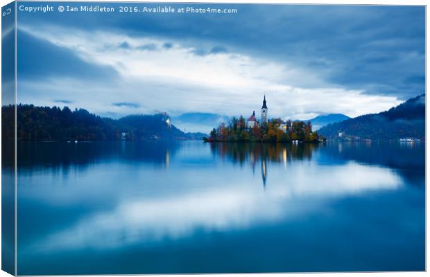 Autumn dusk at Lake Bled Canvas Print by Ian Middleton