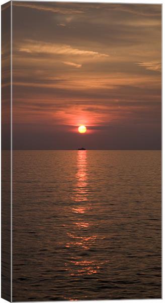 Sunset over Pula Canvas Print by Ian Middleton